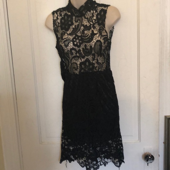 Dresses & Skirts - Sexy black lace sheer mini dress S